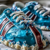 Graduation Sports Jersey Cake with fondant jersey details and edible numbers, perfect for celebrating a boys graduation with a personalized sports theme.